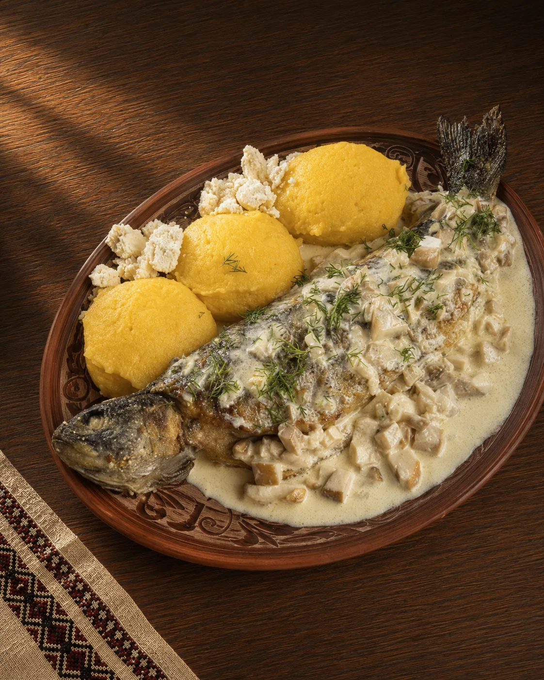 Trout served on a plate at the Stizhok restaurant